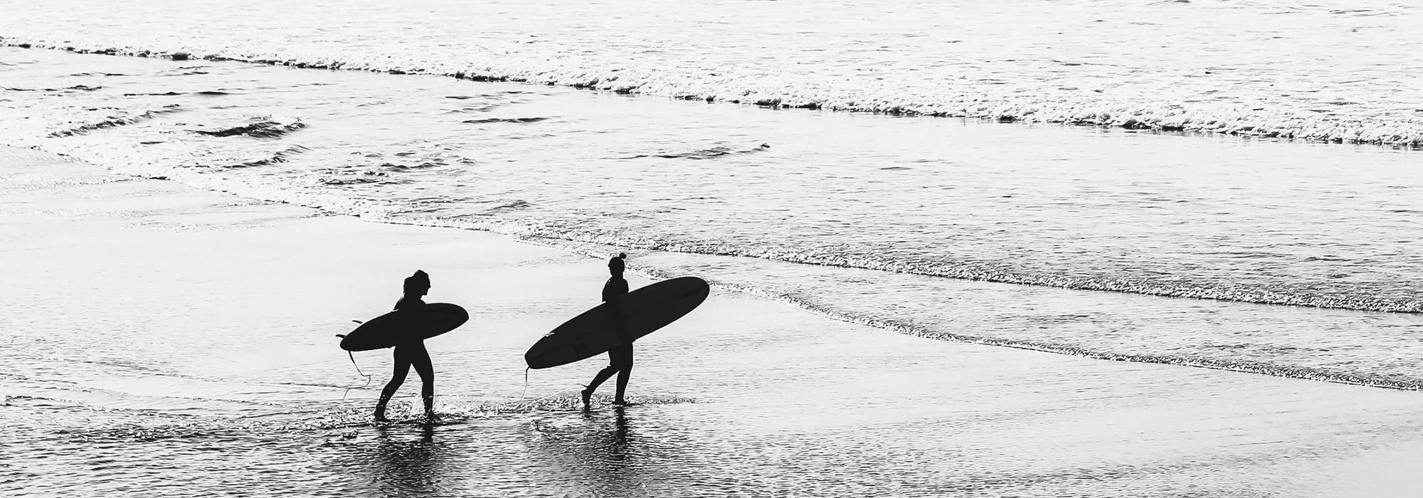 Alt text: Surf poster featuring bold colors and dynamic wave designs, capturing the energy and spirit of surfing and beach life.