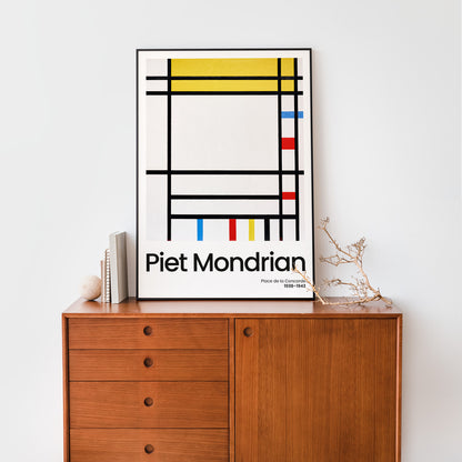 Abstract geometric painting Place de la Concorde by Piet Mondrian with bold black lines and blocks of red yellow and blue primary colors poster, framed and displayed in home decor