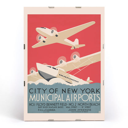 Vintage poster of stylized airplanes flying over water for City of New York municipal airports featuring bold artwork title and locations Floyd Bennett Field and North Beach, framed and displayed in modern living room decor
