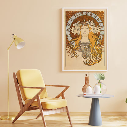 Art Nouveau poster of Sarah Bernhardt with flowing hair floral crown and lilies by Alphonse Mucha from La Plume, framed and displayed in home decor