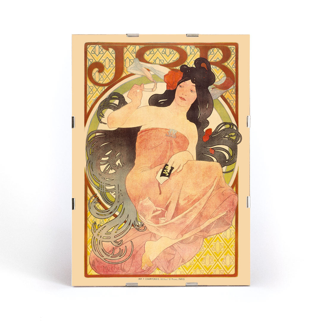 Art Nouveau poster by Alphonse Mucha featuring an elegant woman in a flowing dress with dark hair titled Job, framed and displayed in modern living room decor