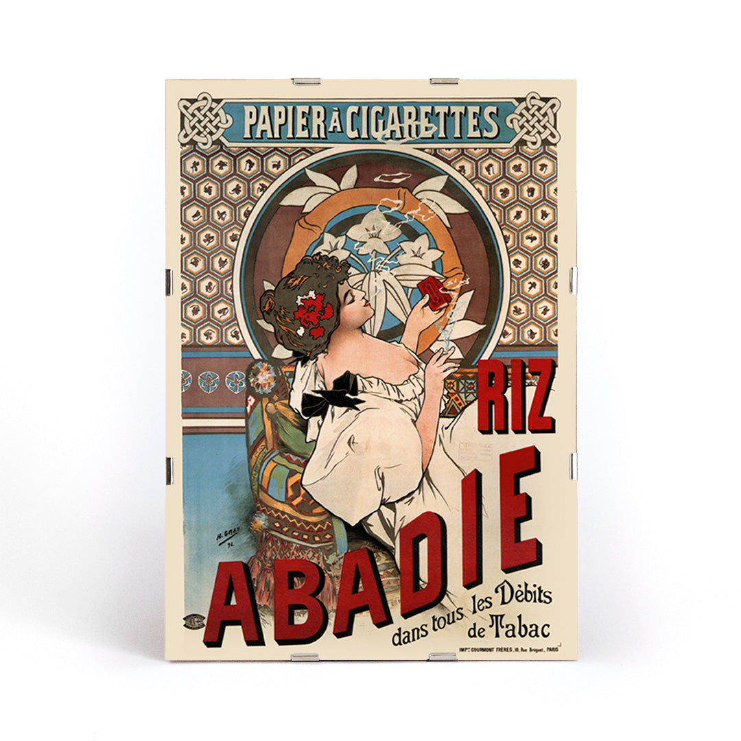 Art nouveau posters by Alphonse Mucha featuring women with floral backgrounds and Riz Abadie cigarette papers, framed and displayed in modern living room decor