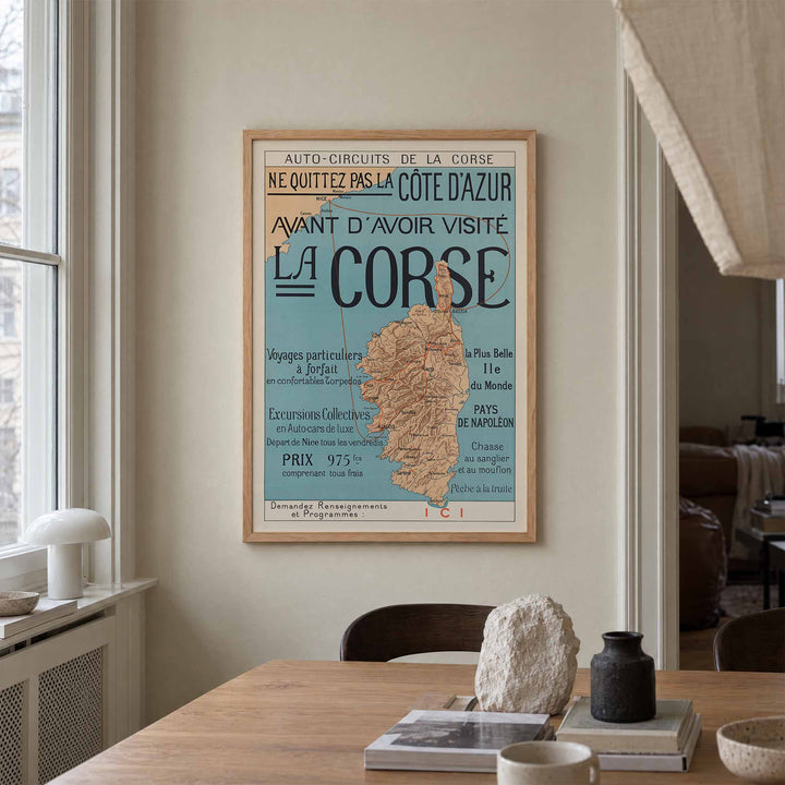 Auto-Circuits de la Corse poster map of Corsica with touring routes and sea connections to Nice and Cannes, with wooden magnetic frame on white background