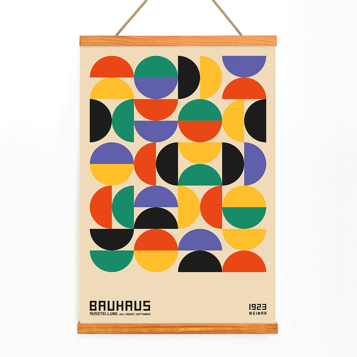 Bauhaus Poster 11 with colorful geometric shapes in a grid pattern inspired by the Weimar Exhibition artwork, with wooden magnetic frame on white background