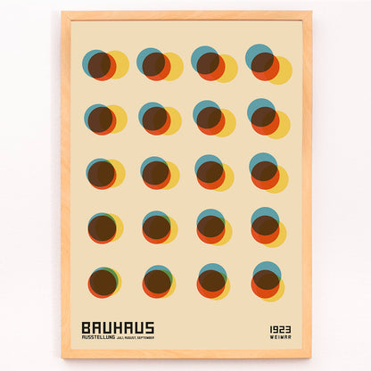 Bauhaus Poster 7 inspired by the 1923 Weimar Exhibition featuring colorful geometric overlapping circles in blue red yellow and brown tones, framed and displayed in modern living room decor