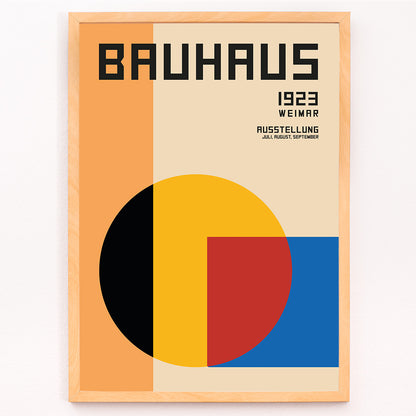 Bauhaus Poster 1 inspired by the Weimar Exhibition featuring geometric shapes in warm bold colors and modernist design style, framed and displayed in modern living room decor