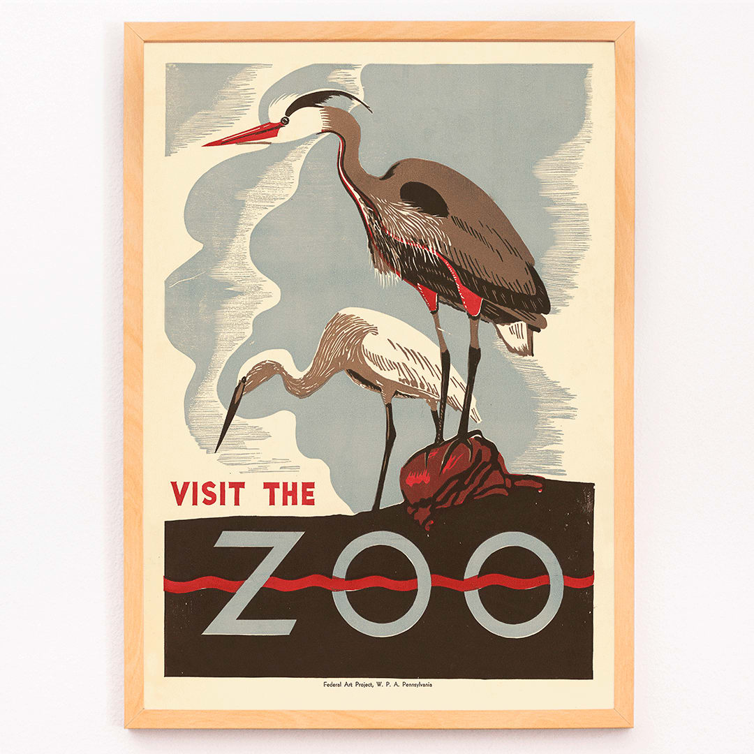 Visit the zoo poster by Federal Art Project WPA Pennsylvania showing two herons standing on a rock with text by the artist, framed and displayed in modern living room decor