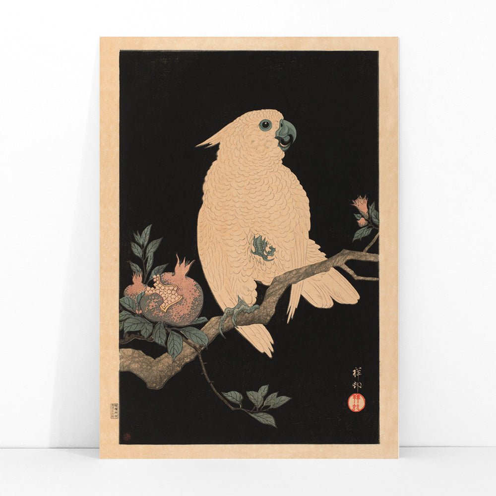 White cockatoo perched on a branch with pomegranate artwork by Ohara Koson poster, framed and displayed in modern living room decor