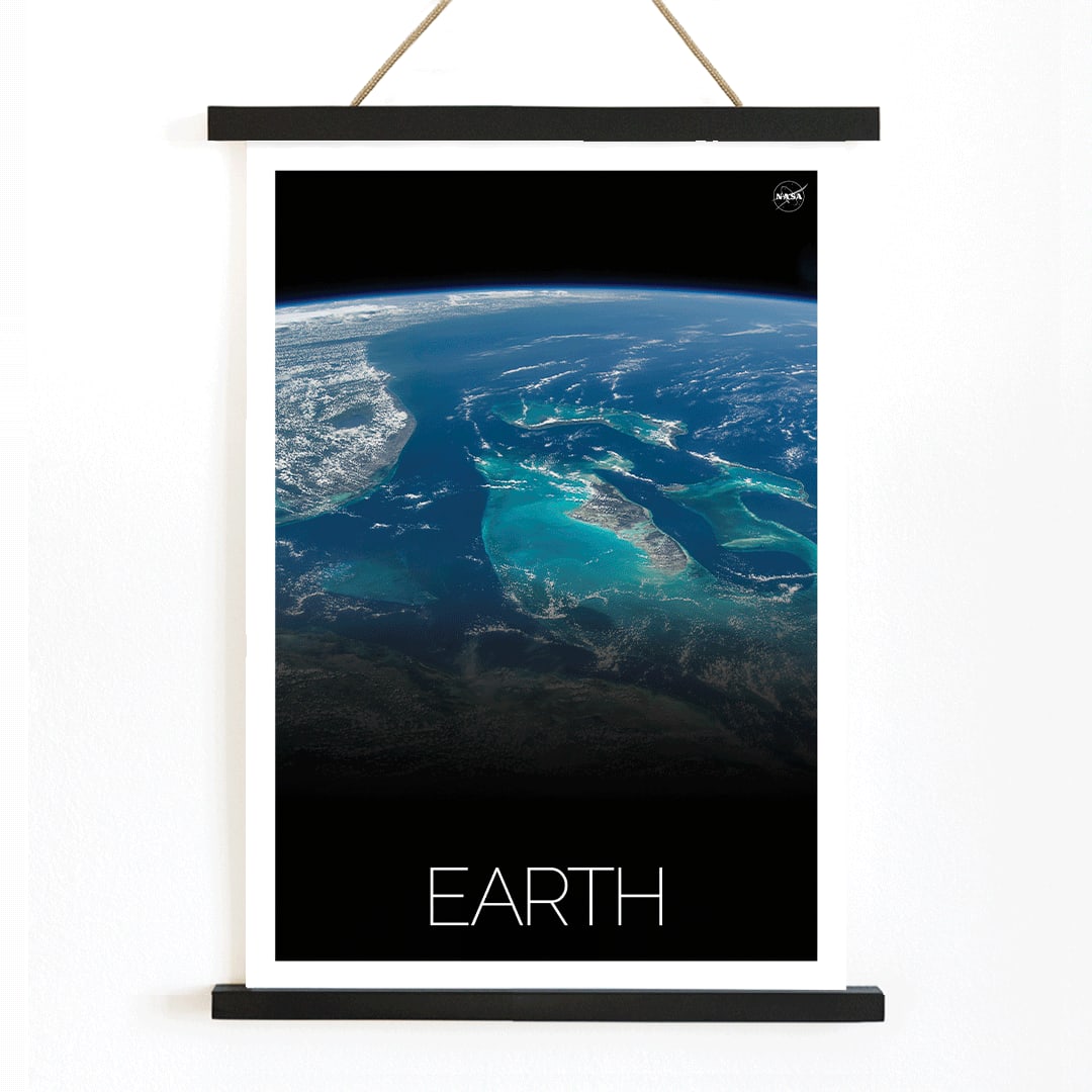 Earth from Space 2 by NASA showing a stunning satellite image of blue oceans continents and clouds, with wooden magnetic frame on white background
