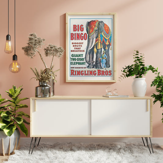 Colorful circus elephant and trainer poster artwork featuring Big Bingo a decorated giant elephant and circus keeper with vibrant circus themed graphics, framed and displayed in home decor