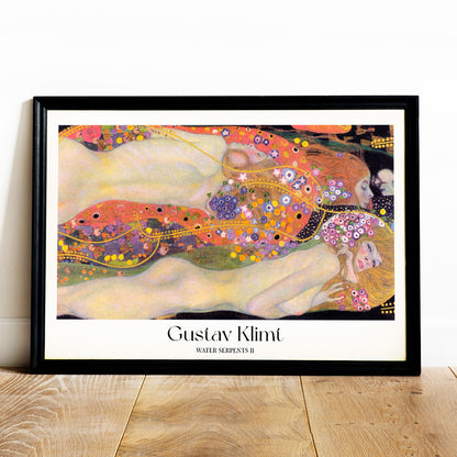 Gustav Klimt Water Serpents II colorful Art Nouveau painting and poster featuring intertwined nude women with vibrant floral and gold decorative patterns, framed and displayed in home decor