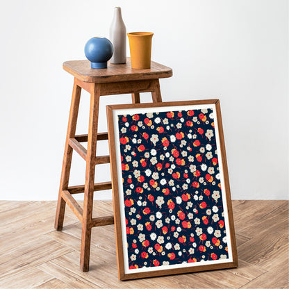 Colorful floral pattern poster with white gray pink and red flowers on dark background by Charles Goy, framed and displayed in home decor