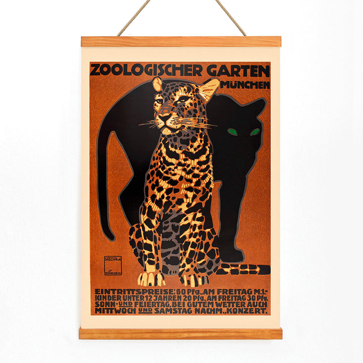 Leopard and black panther poster for Zoologischer Garten München by Ludwig Hohlwein featuring bold text artwork, with wooden magnetic frame on white background