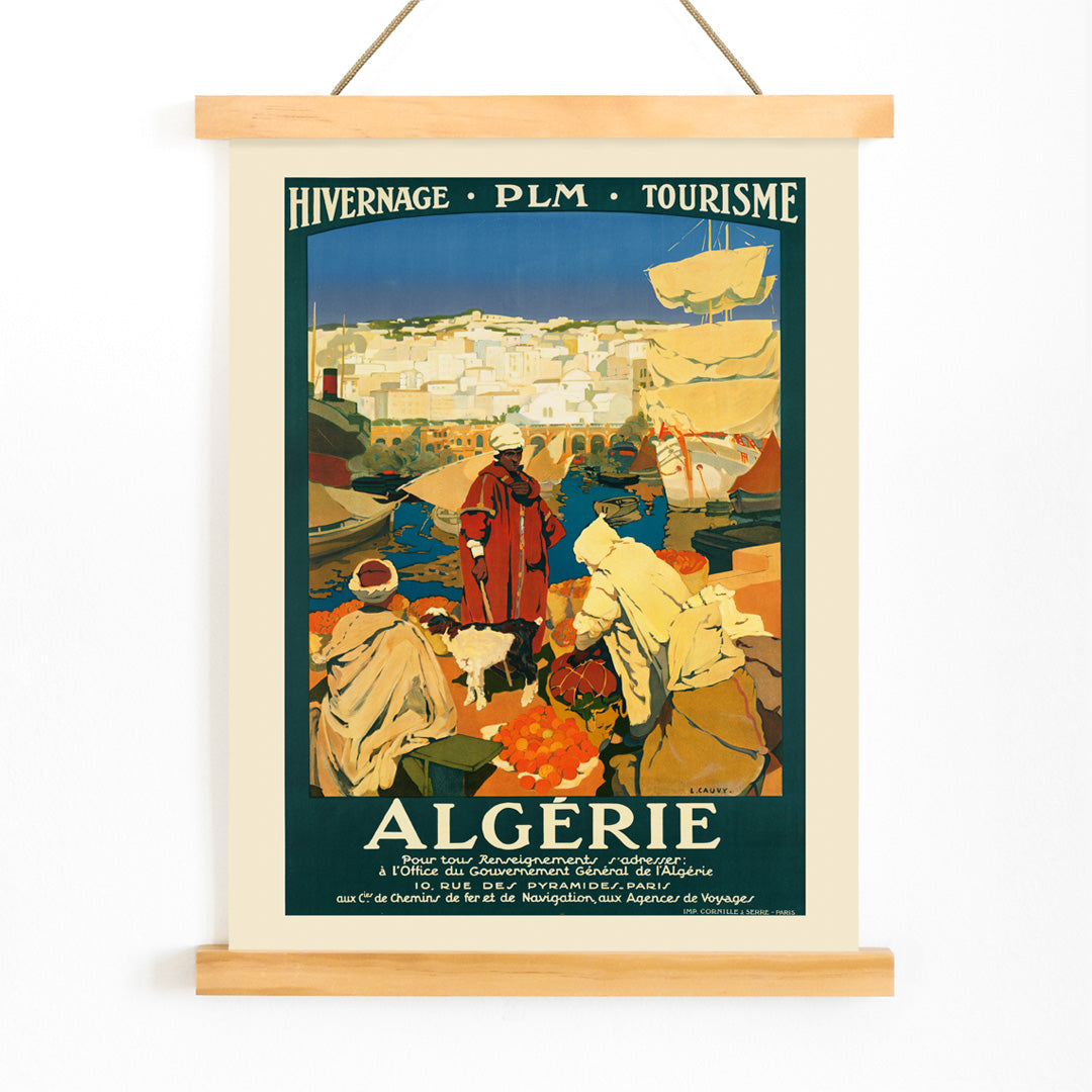 Colorful Algerian harbor market scene with people in traditional clothing by Leon Cauvy travel artwork poster, with wooden magnetic frame on white background