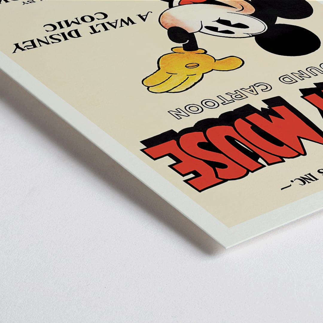 Closeup detail of Mickey Mouse poster by Ub Iwerks and Walt Disney featuring Sound Cartoon comic artwork with Mickey smiling in yellow gloves and red shorts