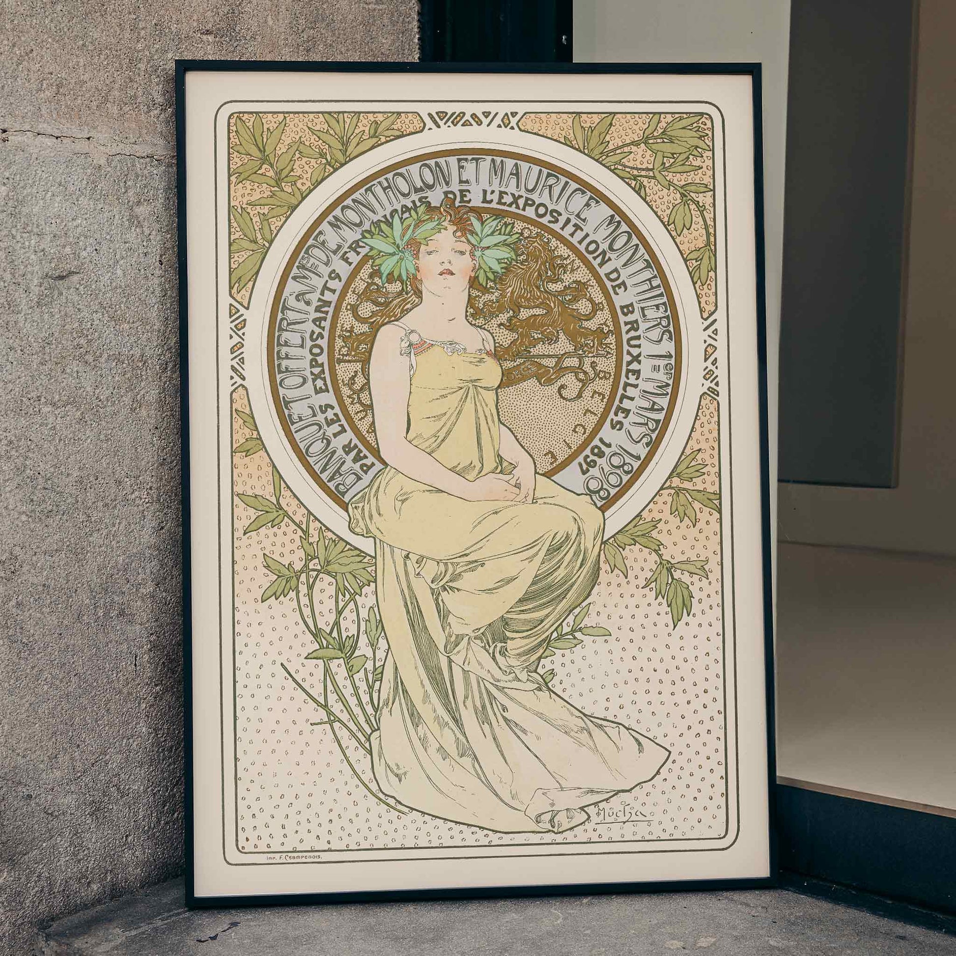 Alphonse Mucha Exposition de Bruxelles Art Nouveau poster with graceful woman and floral ornaments in soft green and beige tones, framed and displayed in home decor