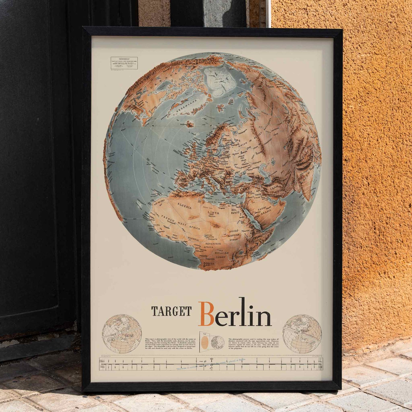 Vintage map illustration and poster of a globe centered on Europe and Africa with Target Berlin artwork Army Orientation Course by Manning FE, framed and displayed in home decor