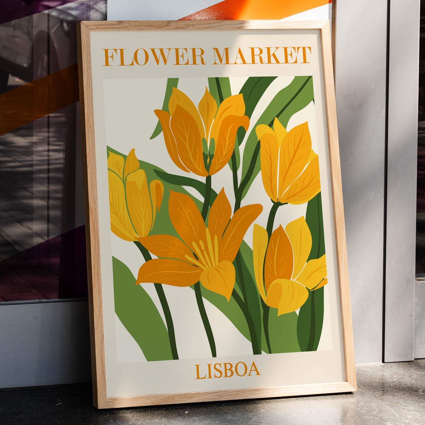 Yellow and orange flowers with green leaves illustrated poster titled Flower Market Lisbon by Moryarty, framed and displayed in home decor