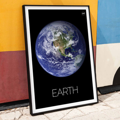 Stunning NASA image of Earth from space titled Earth from Space 1 on a black background poster, framed and displayed in home decor