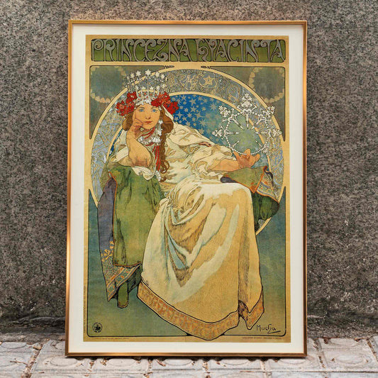 Art Nouveau poster of Princess Hyacinta in flowing gown with crown and floral accents by Alfons Mucha, framed and displayed in home decor