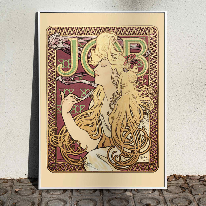 Art Nouveau poster of elegant woman with flowing hair holding a cigarette and decorative patterns by Alphonse Mucha, framed and displayed in home decor