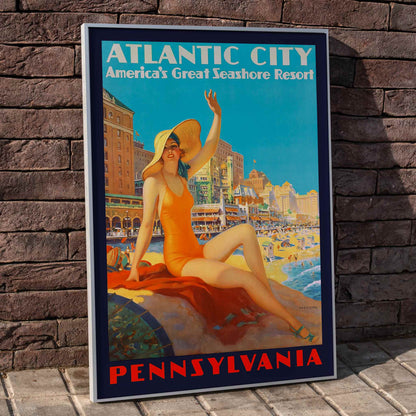 Atlantic City beach scene and Pennsylvania Railroad poster by Edward M Eggleston featuring woman in orange swimsuit at beach resort, framed and displayed in home decor