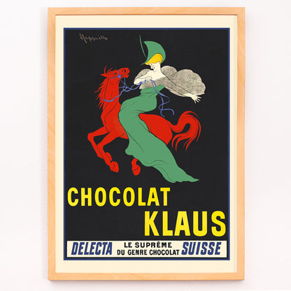 Closeup detail of Chocolat Klaus poster by Leonetto Cappiello showing a woman in a flowing green dress riding a red horse on a black background