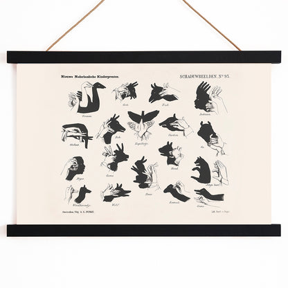 Vintage hand shadow puppet illustrations and animal shapes poster from Shadow Hands by George Lodewijk Funke artwork, with wooden magnetic frame on white background