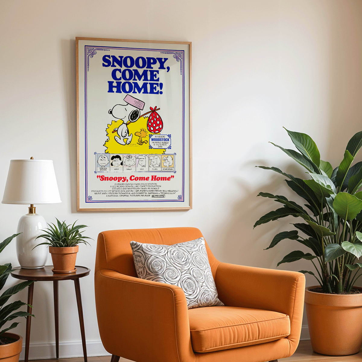 Snoopy Come Home movie poster by Charles Schulz featuring Snoopy Woodstock Lucy and Charlie Brown in colorful Peanuts illustration, framed and displayed in modern living room decor