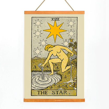The Star tarot card by Lauron William de Laurence showing a woman pouring water from jugs under a starlit night sky tarot poster, with wooden magnetic frame on white background