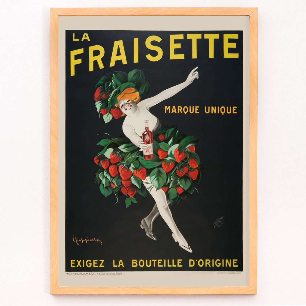 Closeup detail of The Fraisette by Leonetto Cappiello poster featuring a whimsical woman in a strawberry costume holding a bottle of liqueur against a black background